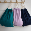 Drawstring Bags in green, purple, and blue