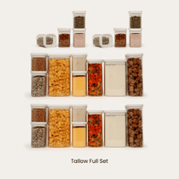 Full set of tallow rectangle glass pantry jars with varying heights paired with eight smaller square spice jars.