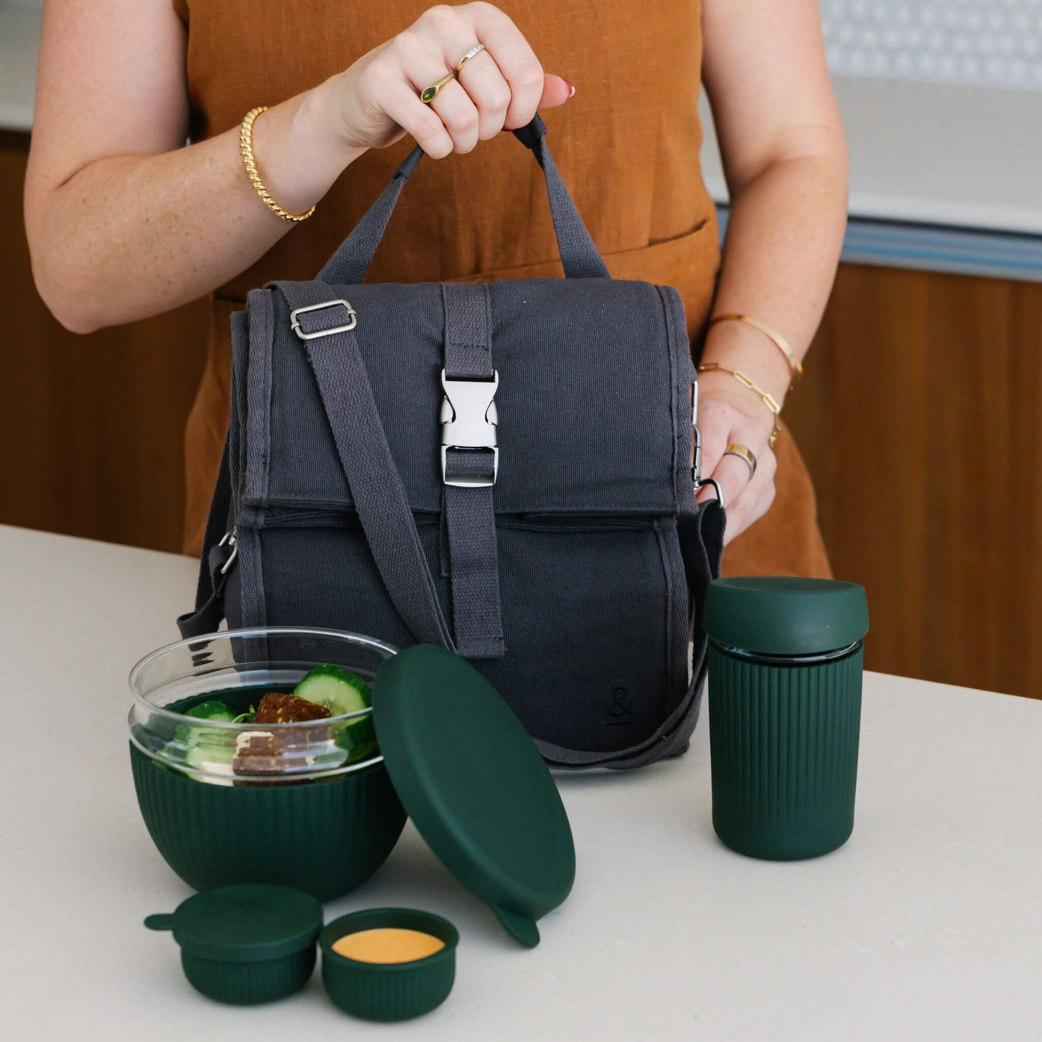 tall covered and lidded coffee to go container