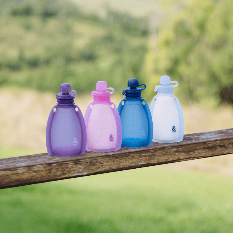 4 colours for the baby food pouches from purple, pink to blue and white